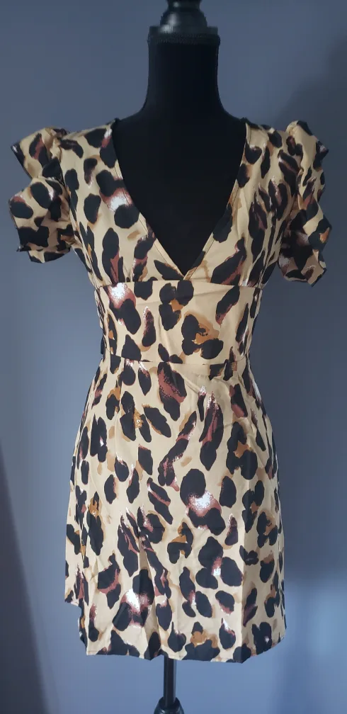 Women's Clothing Bundle: Jumpsuit, Sweater, and Dresses image indicator(5)