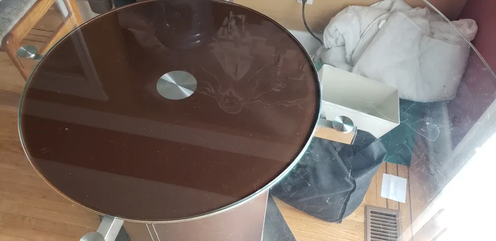 Round Glass Dining Table with Rotating middle image indicator(6)