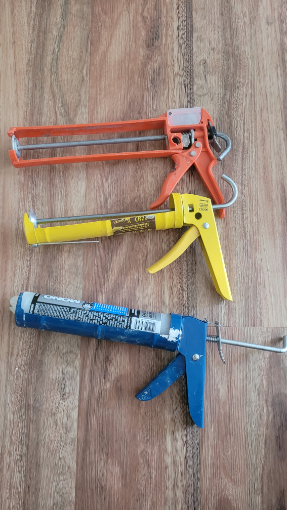 Three Caulking Guns