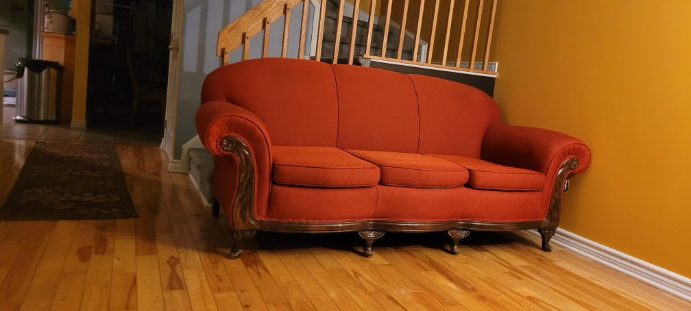 Vintage Red Three-Seater Sofa