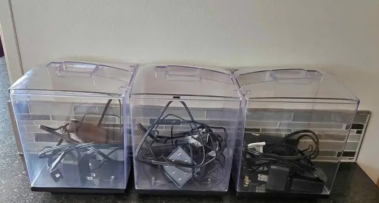 two Clear Plastic Storage Containers with Electronics