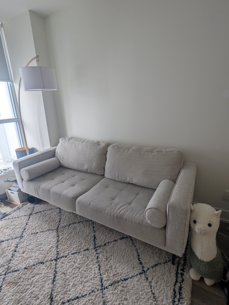Ashley Homes Caladeron sofa couch with bolster pillows