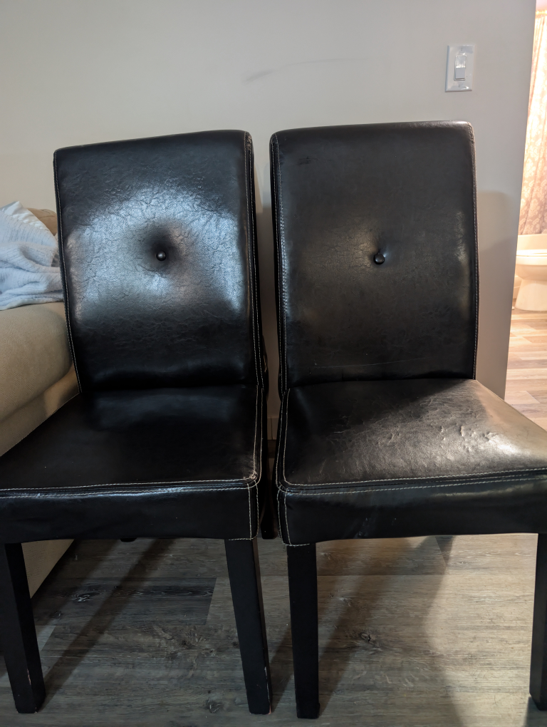 Two Black Leather Dining Chairs