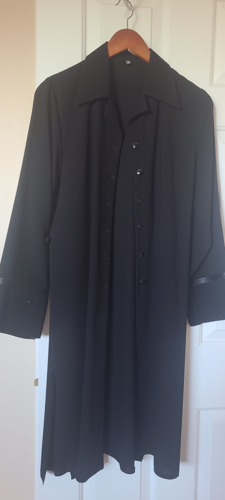 Black button-down long-sleeved tunic