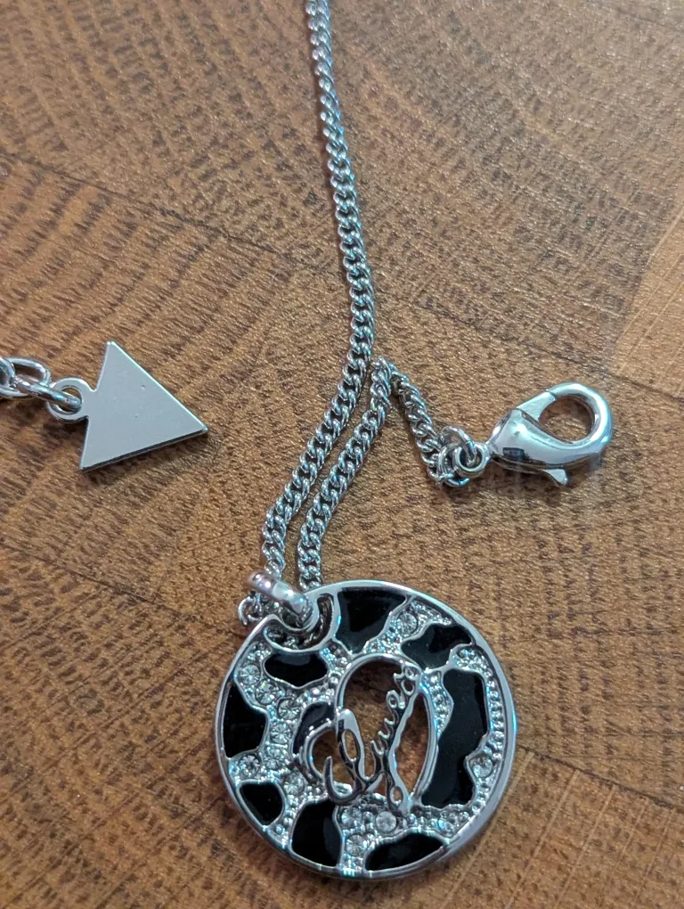 GUESS Silver Tone Necklace with Rhinestone Pendant image indicator(6)