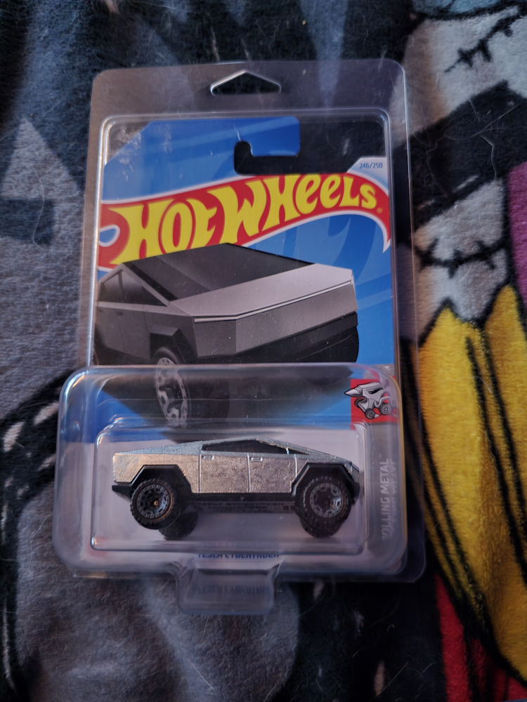 Hot Wheels Tesla Cybertruck Rolling Metal 1/64 Scale Collectible