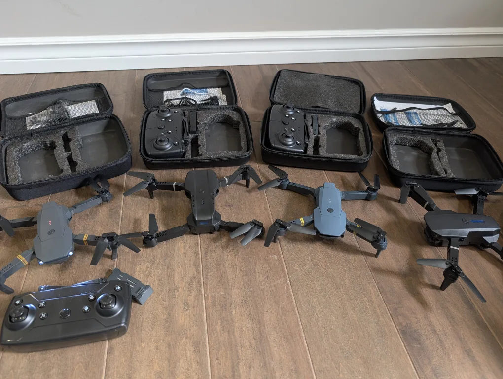 Brand New Drones with Cases and Controllers image indicator(8)