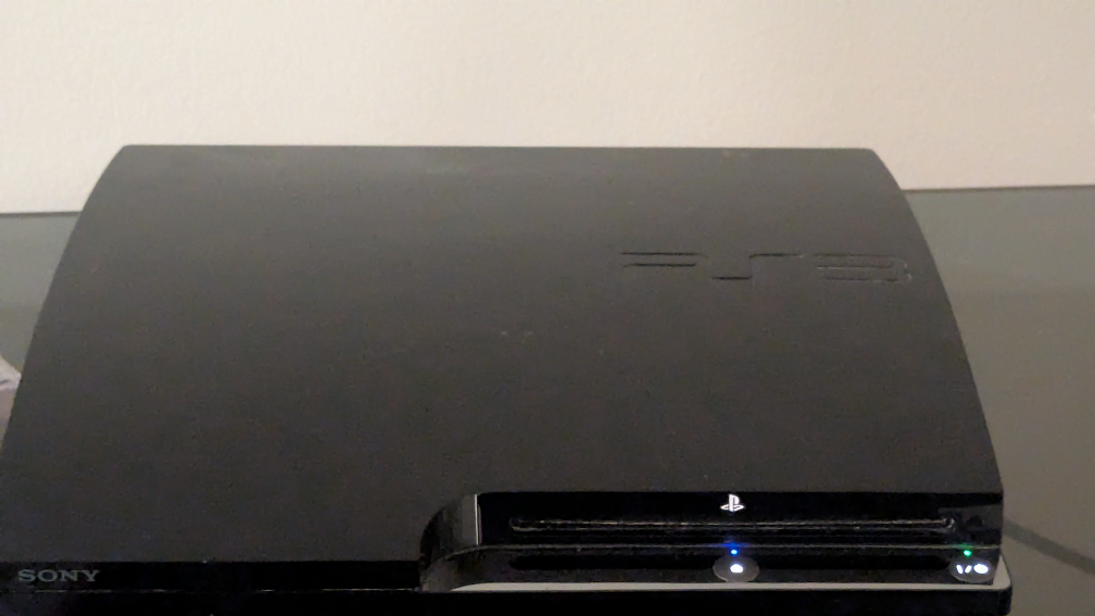 PS3 Console with Games and Controllers