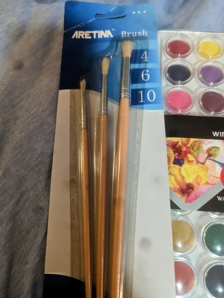 36 different watercolor paints tray and 3 paint brush set image indicator(2)