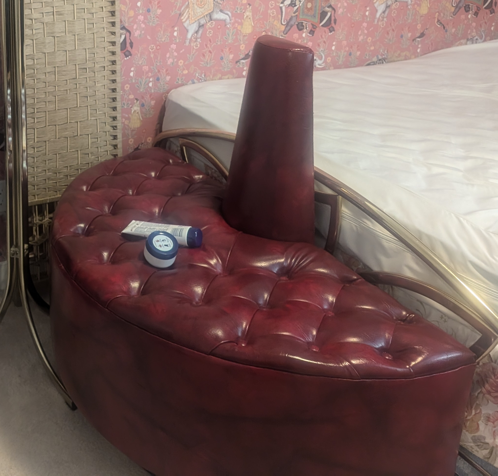 Circular Burgundy Leather Bench
