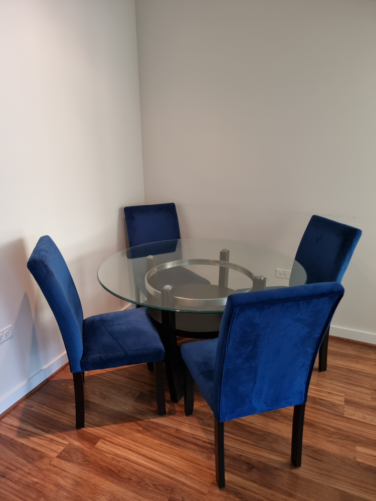 Glass-top Dining Table Set with Four Blue Velvet Chairs