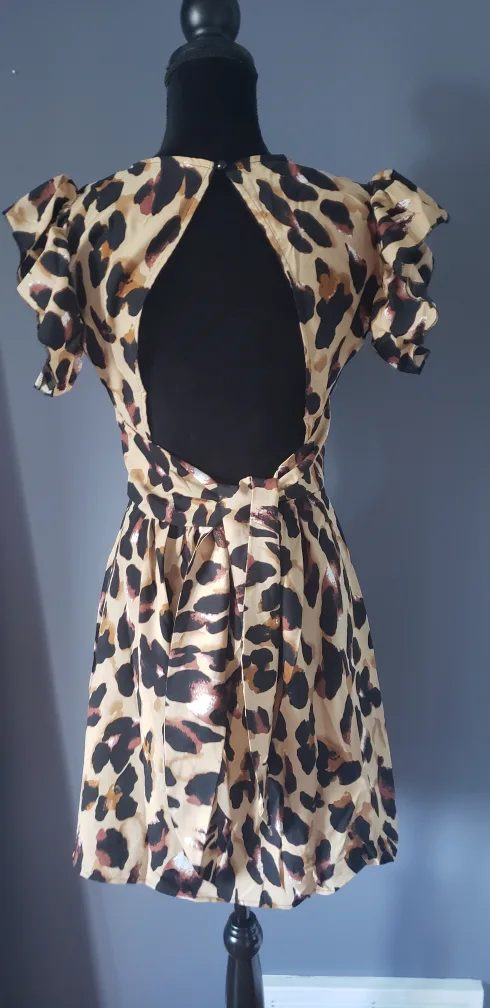 Women's Clothing Bundle: Jumpsuit, Sweater, and Dresses image indicator(6)