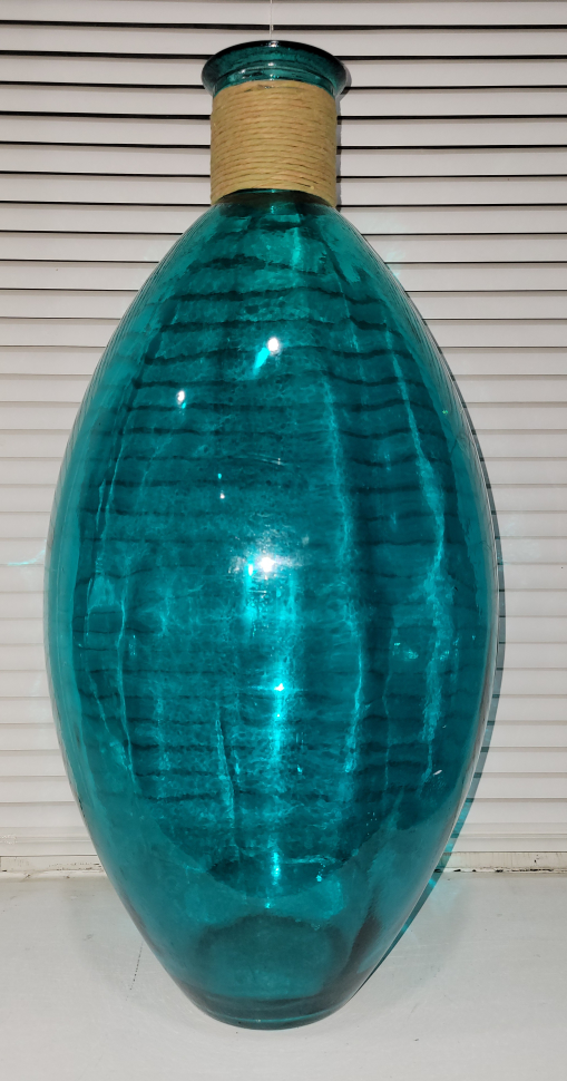 Tall floor aqua glass vase with rafia