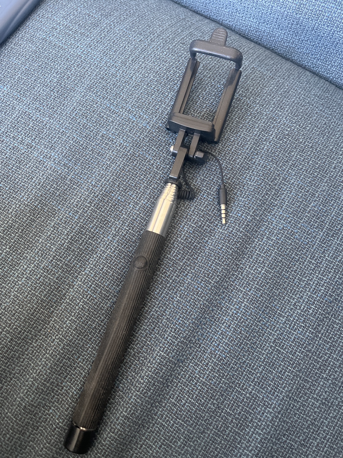 Selfie stick with shutter button