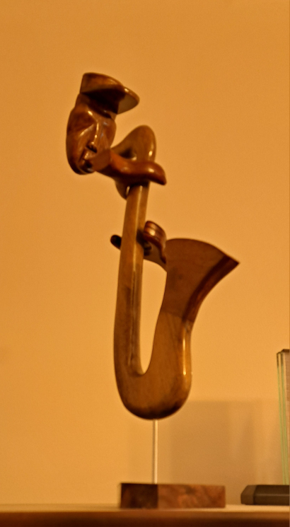 Wooden Saxophone Sculpture with Figurine