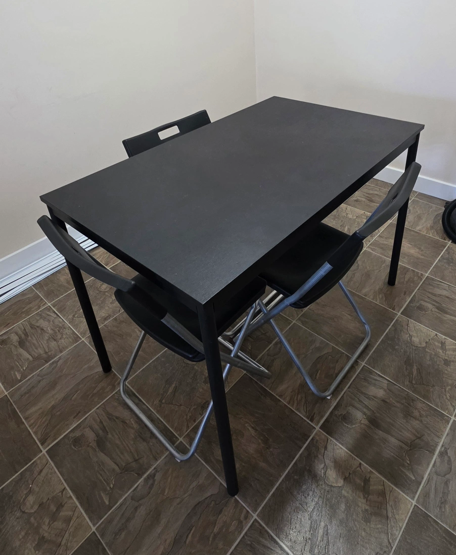 Ikea Black Dining Table with Folding Chairs | Karrot