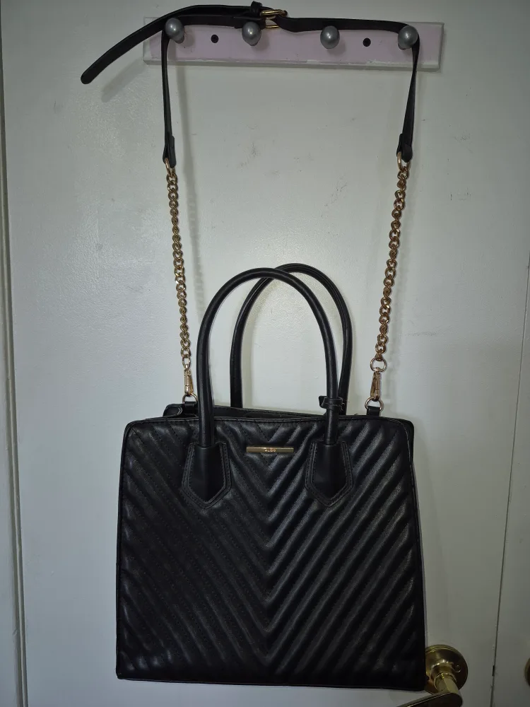 Black quilted satchel handbag with gold chain strap image indicator(3)