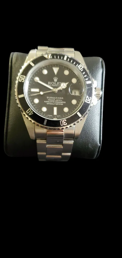 Two Men's Watches: Rolex Submariner and Kenneth Cole image indicator(3)