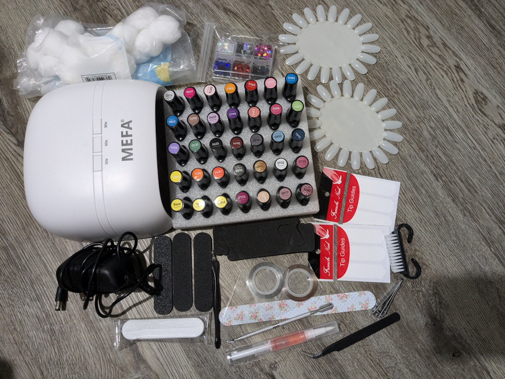 MEFA Nail Polish Kit with UV Lamp and Accessories