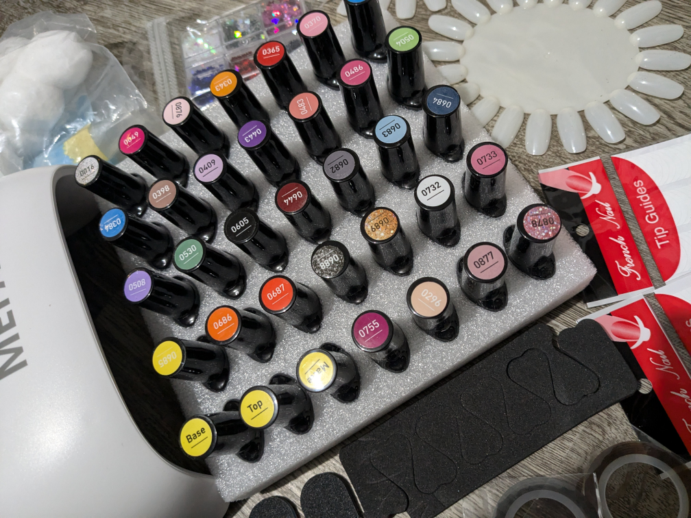 MEFA Nail Polish Kit with UV Lamp and Accessories - photo 2