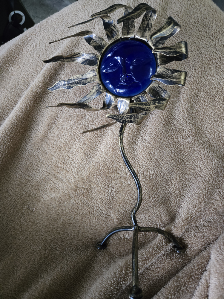 Unique Metal Sun Face Candle Holder
