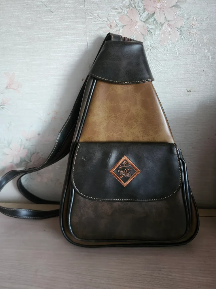 Vintage Leather Sling Backpack thumbnail