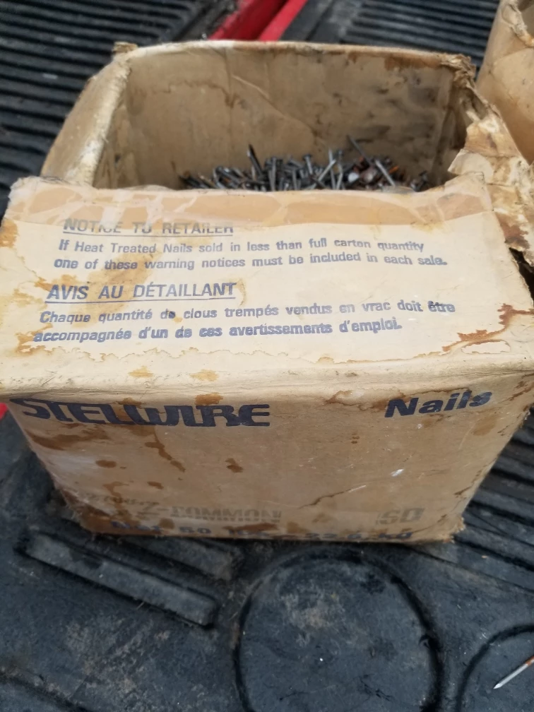Two half boxes of nails. 1 1/2 and 2 1/2 galvanized nails