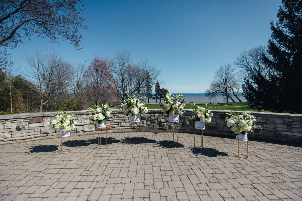 6 Gold Metal Plant Stands with Blue Planters image indicator(3)