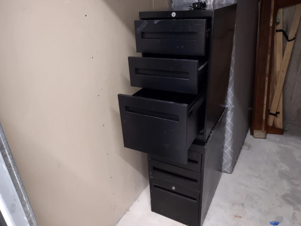 Two Black Metal Filing Cabinets