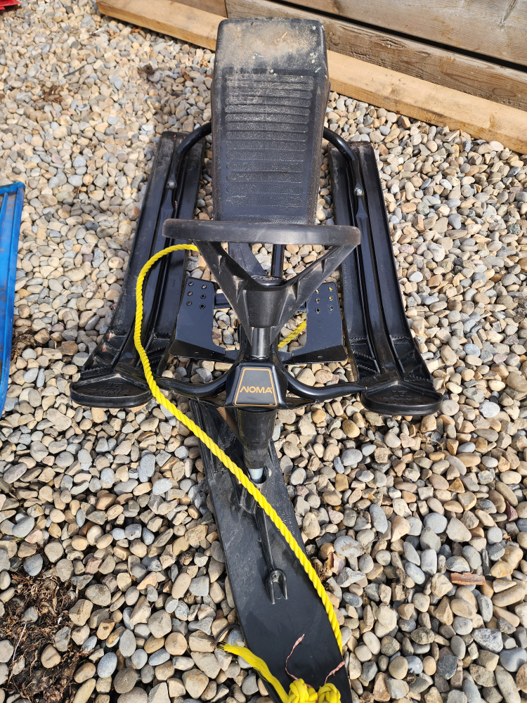 Two snow sleds