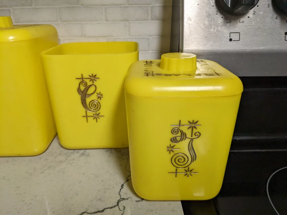 4 vintage canary yellow kitchen canisters image indicator(2)