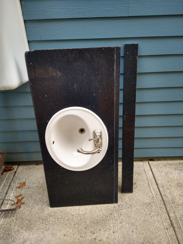 Black Granite Vanity Top with Oval Sink and Faucet