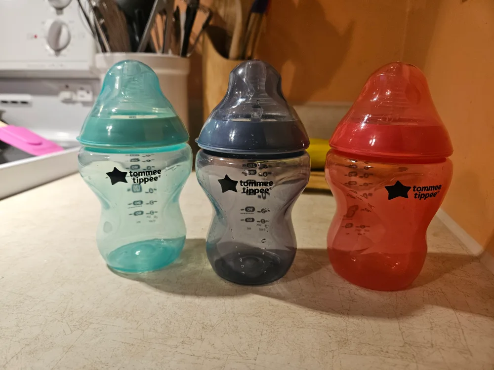 Breast Pump+Bottle Warmer + 5 Like New Bottles image indicator(4)