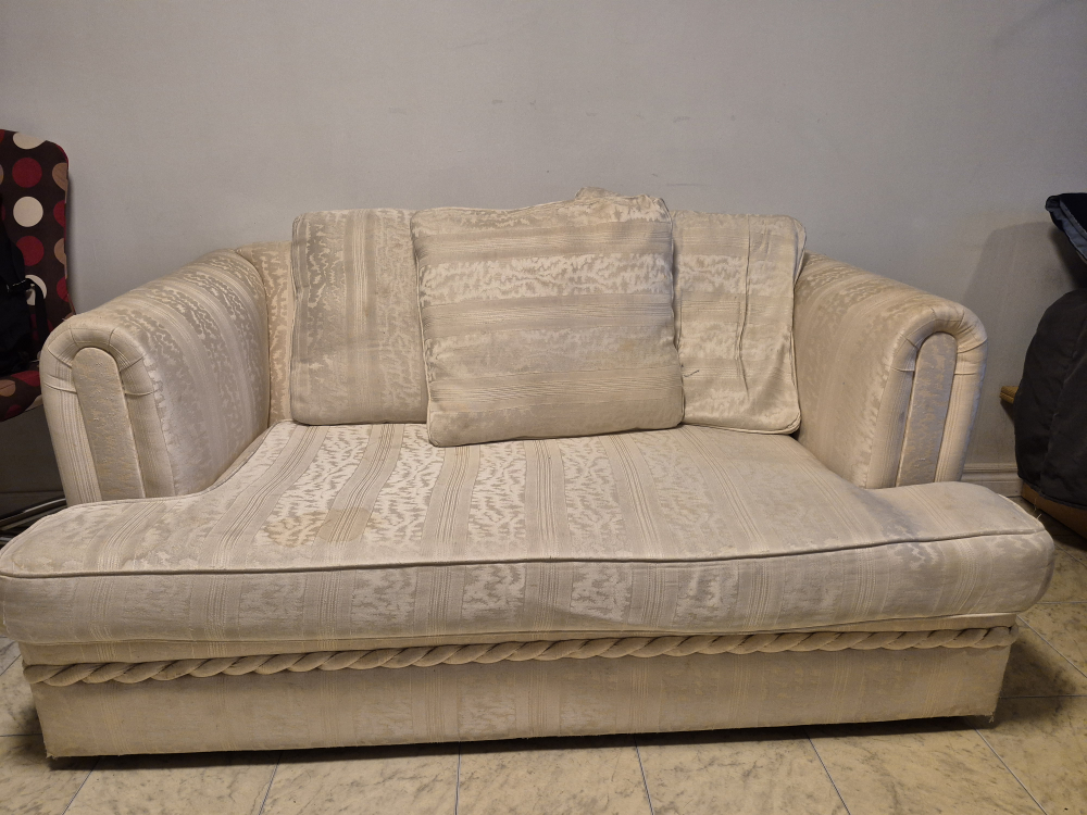 Cream-coloured loveseat