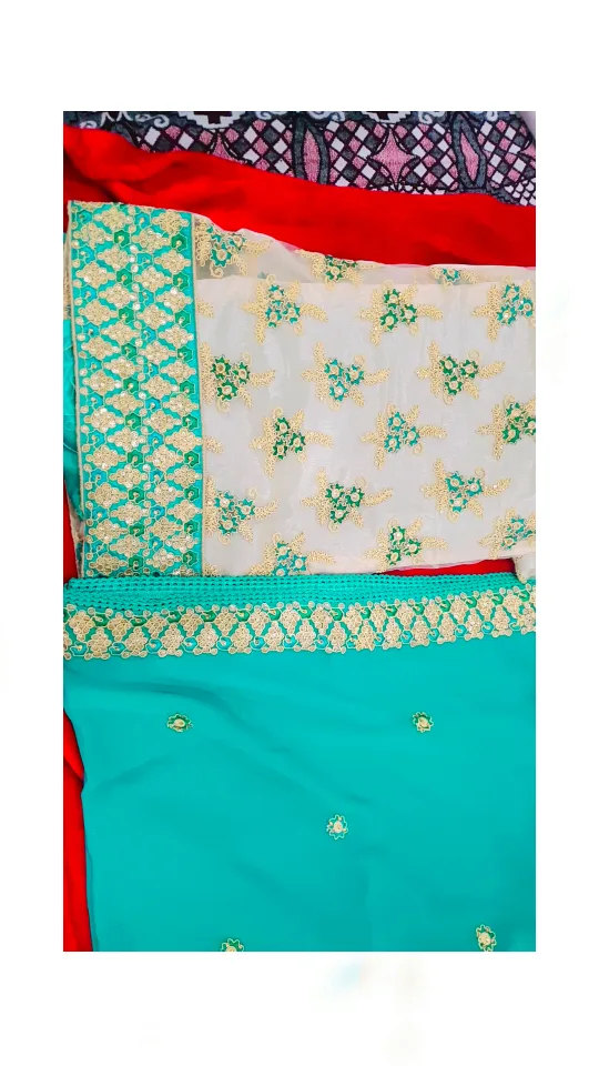 Beautiful teal and white embroidered saree image indicator(2)