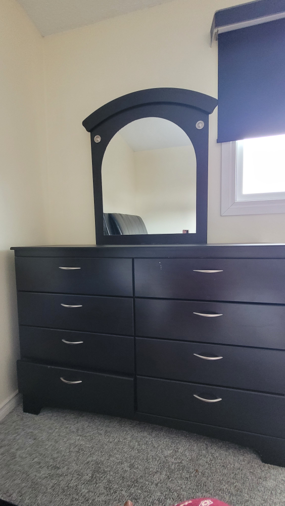 Dark brown dresser with mirror