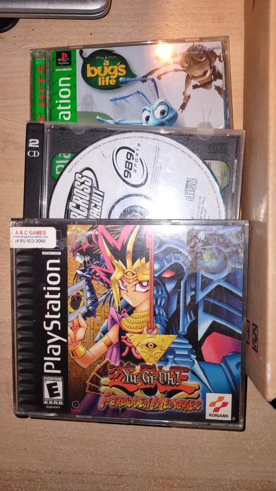 PlayStation One w/ controller and 4 games image indicator(4)