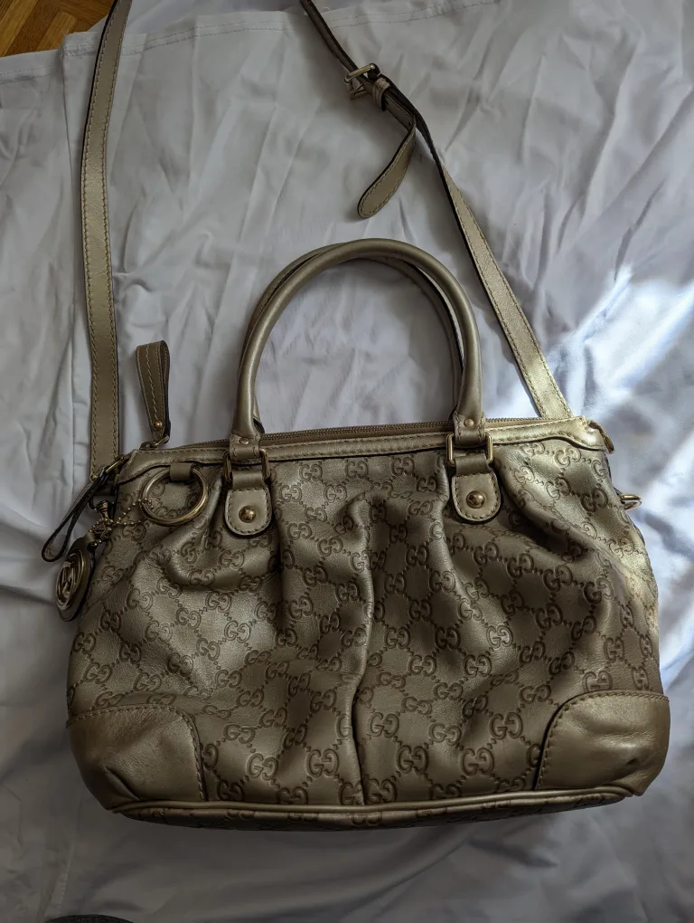 Authentic Gucci GG Monogram Metallic Gold Leather Handbag image indicator(2)