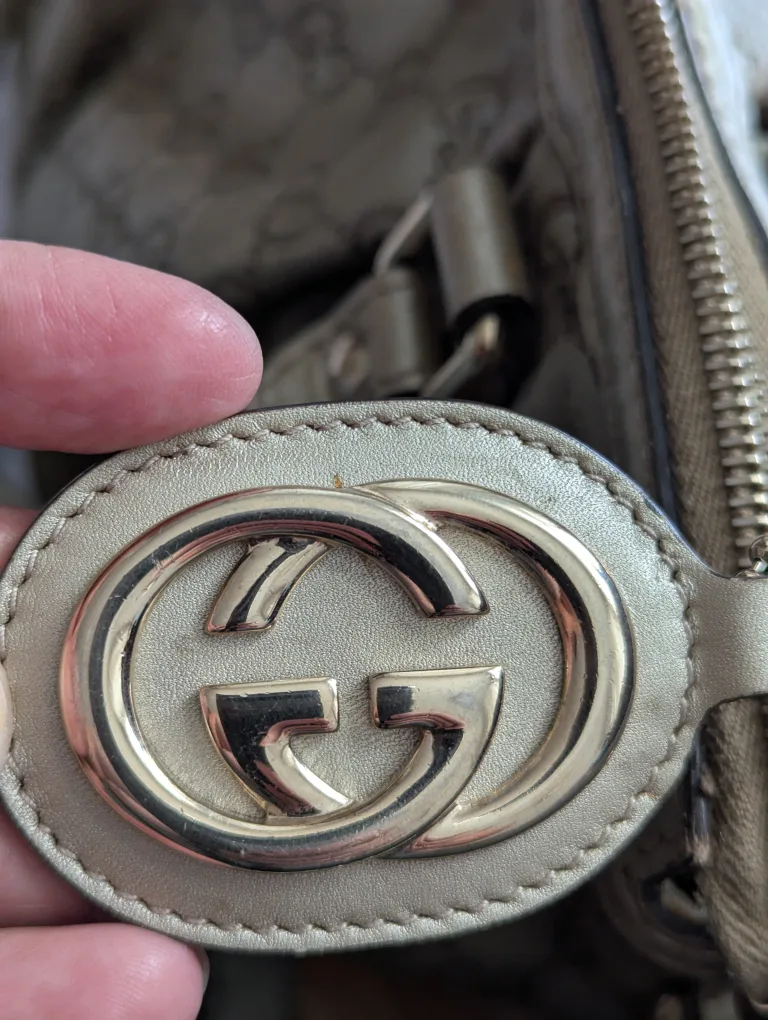 Authentic Gucci GG Monogram Metallic Gold Leather Handbag image indicator(4)