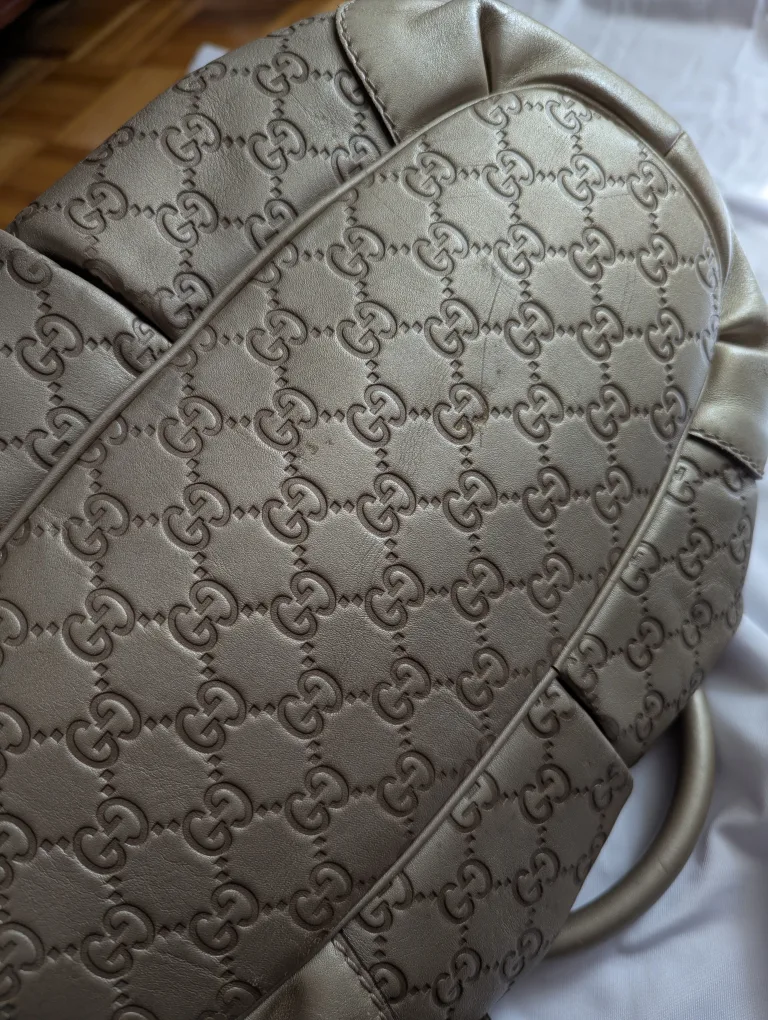 Authentic Gucci GG Monogram Metallic Gold Leather Handbag image indicator(7)