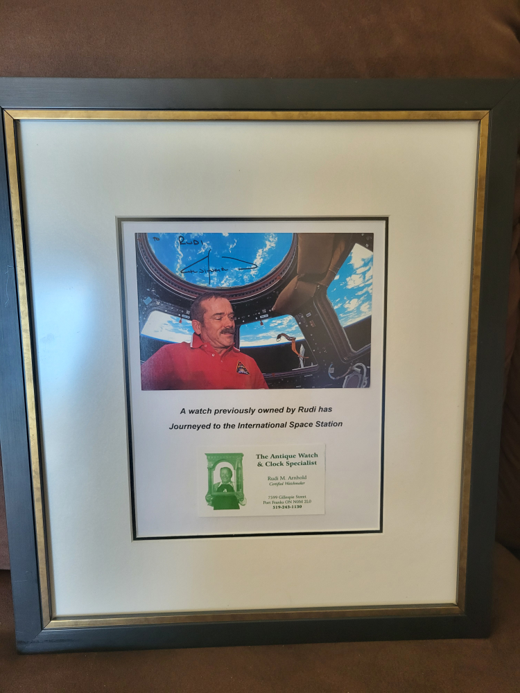 Framed photo of Rudi Arnholld, astronaut, signed