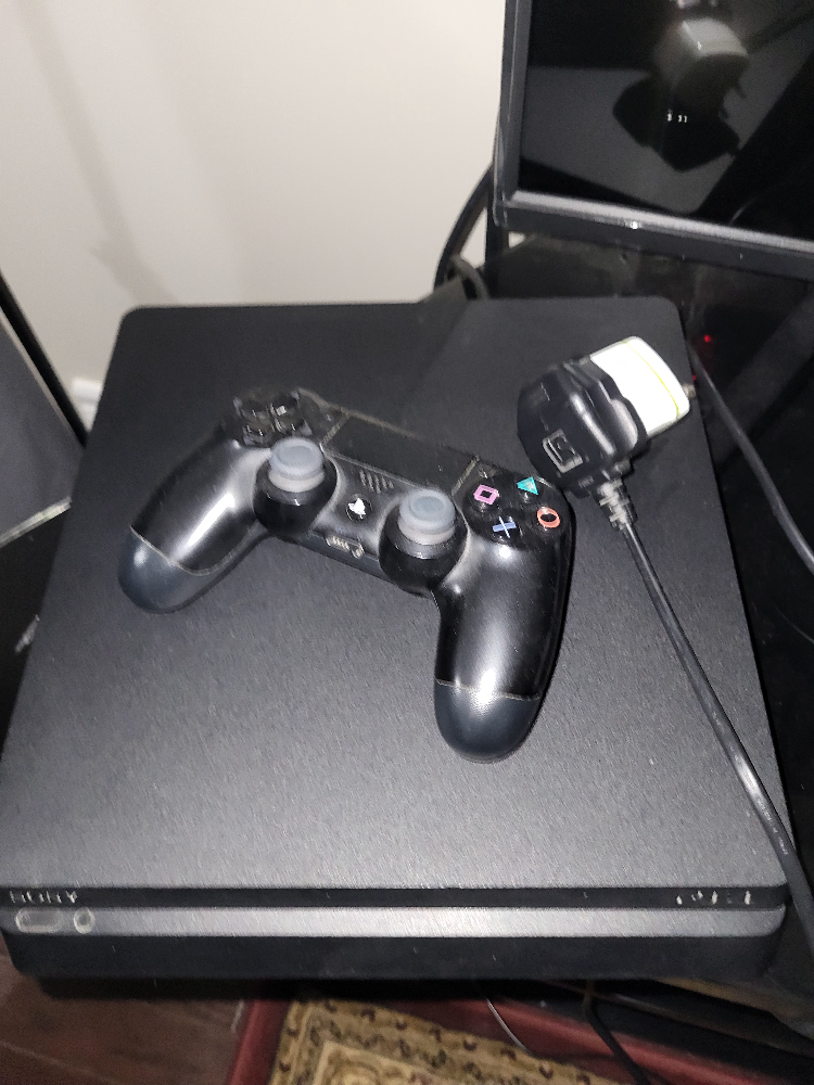 PS4 slim 500 GB with 6 Games and Controller bundle