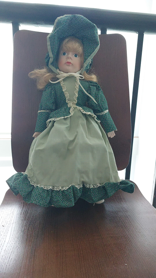 Vintage Porcelain Doll in Green Dress with Bonnet