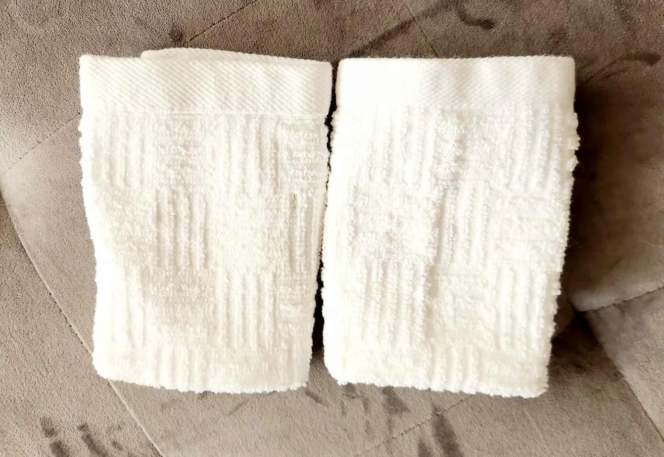 Trio of White Textured Washcloths image indicator(7)