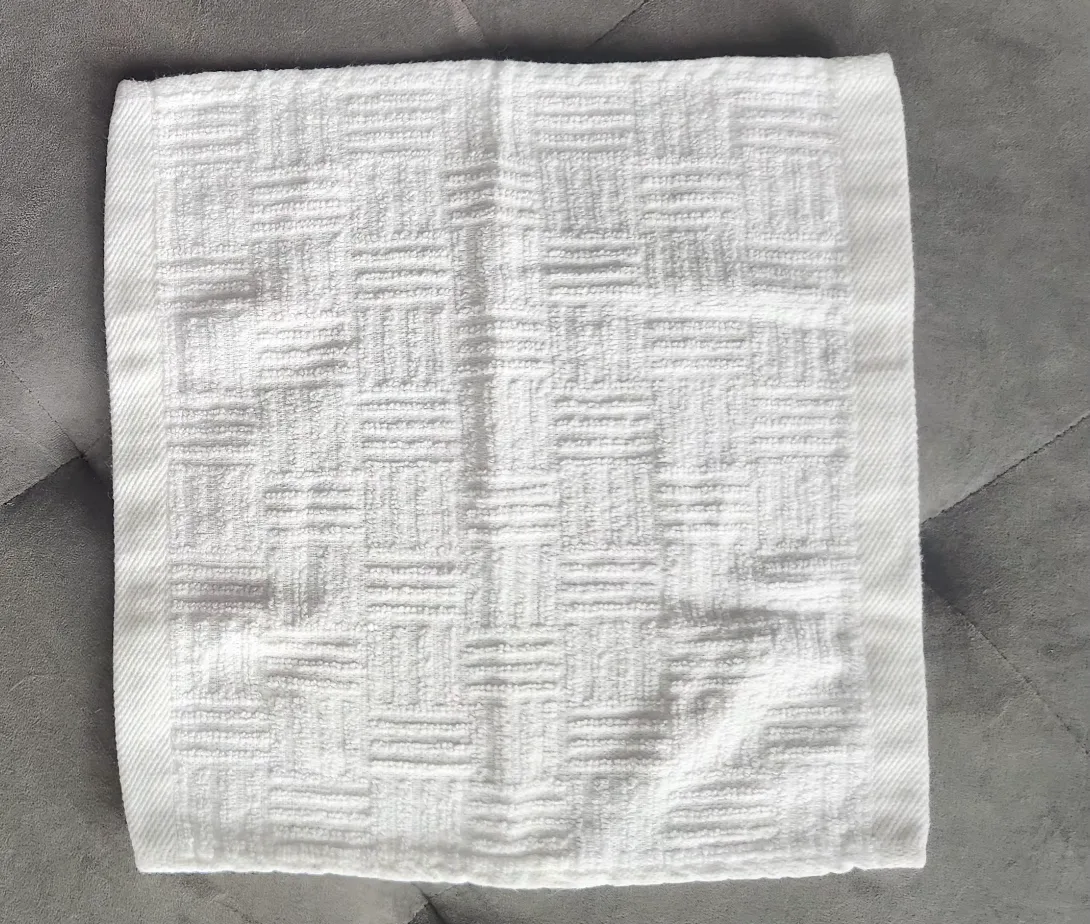 Trio of White Textured Washcloths image indicator(3)
