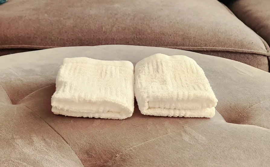 Trio of White Textured Washcloths image indicator(9)