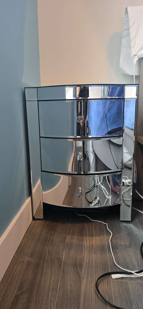 Mirrored bedside table with three drawers