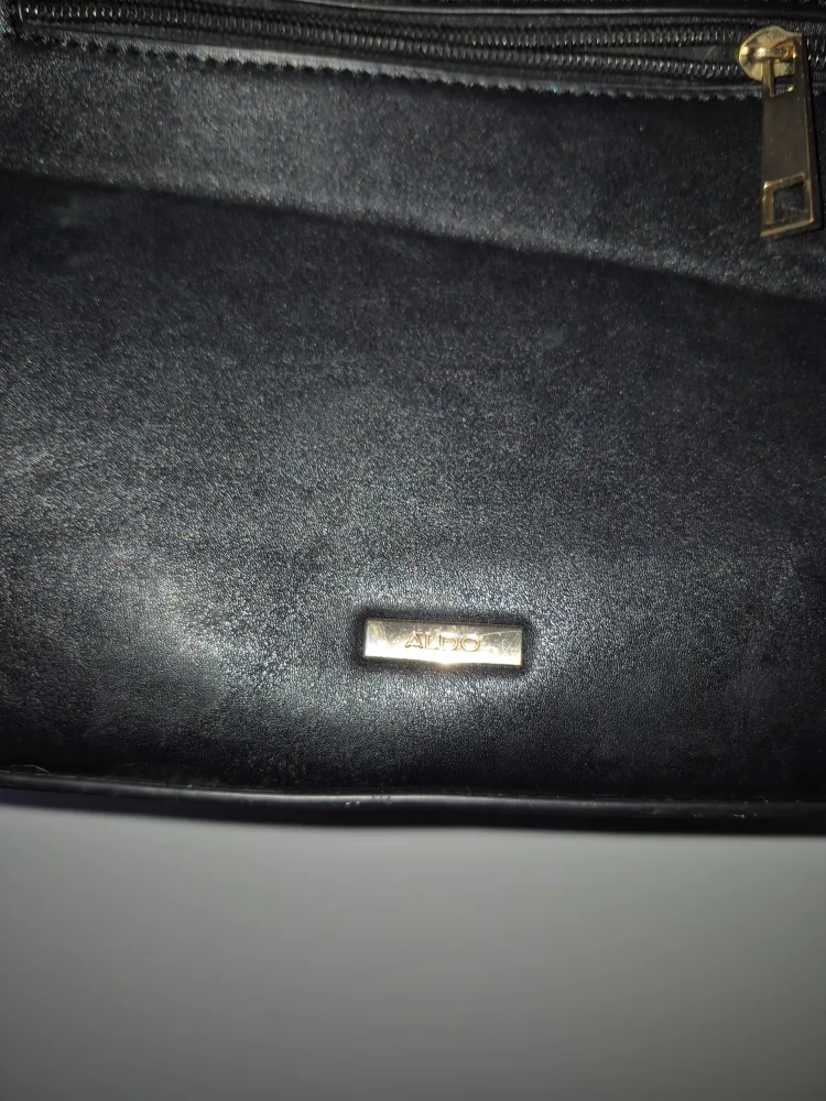 Black quilted satchel handbag with gold chain strap image indicator(6)