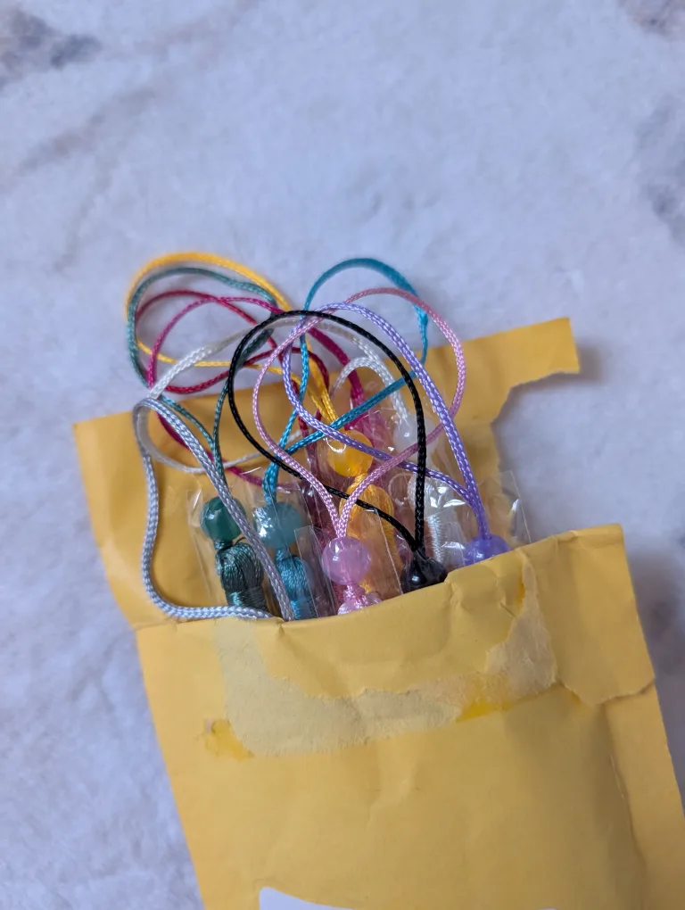 Ten colourful silk tassels image indicator(2)