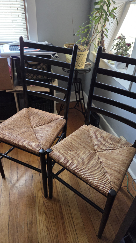Pair of Black Ladderback Chairs with Woven Seats